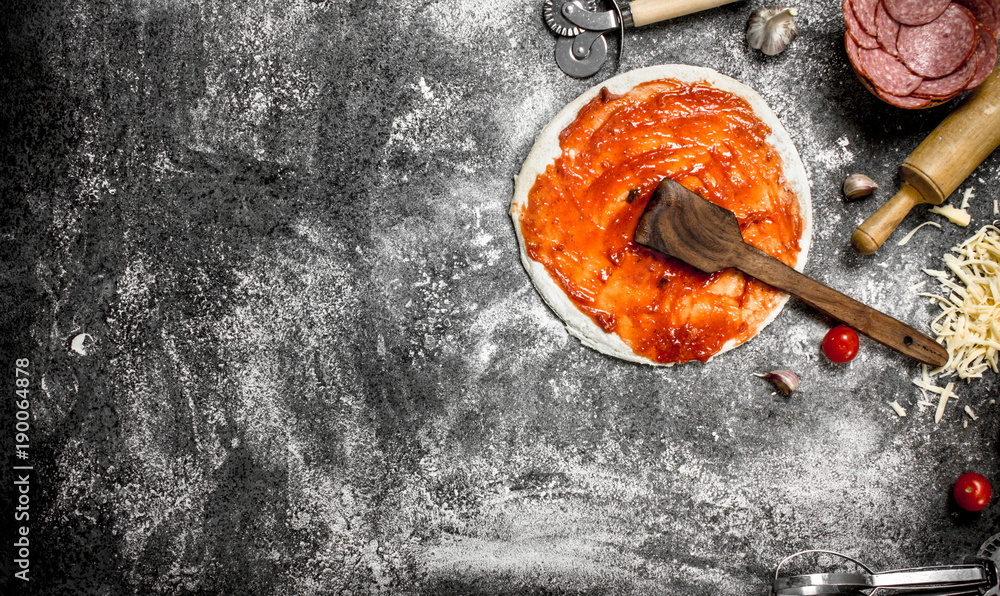 Roll up dough with tomato sauce and various ingredients. Roll up dough with tomato sauce and various ingredients.