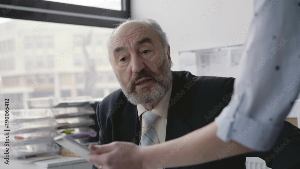 Office girl communicates with boss and uses tablet. 4K Office girl communicates with boss and uses tablet. 4K