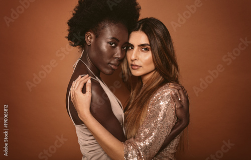 Two young women together in studio