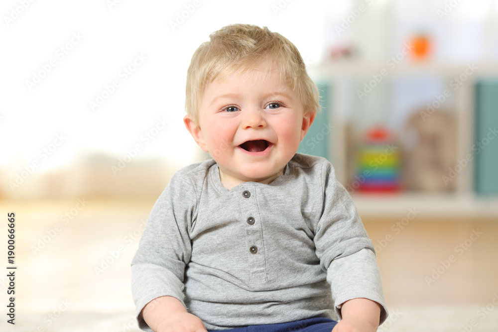 Portrait of a happy baby boy smiling looking at you Portrait of a happy baby boy smiling looking at you