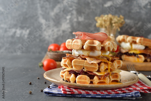 Waffles sandwich with poached egg