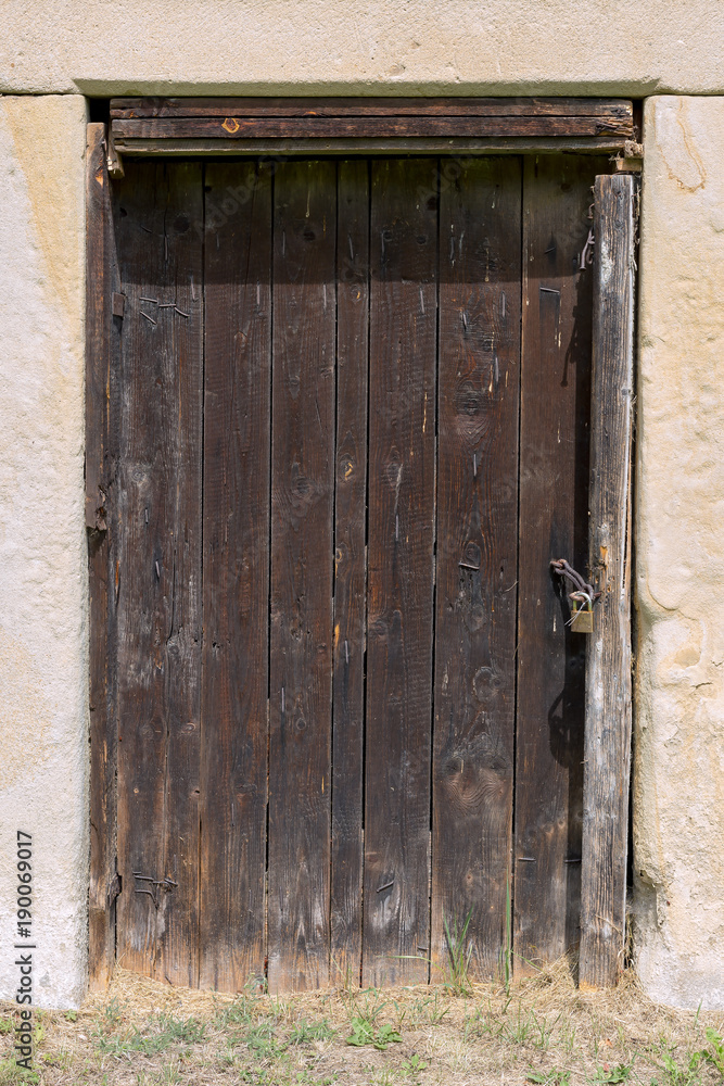 The old wooden door - grunge background texture for design The old wooden door - grunge background texture for design