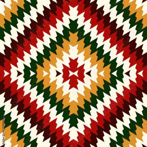 Ethnic style seamless pattern with chevron lines. Native americans ornament. Tribal motif. Colorful mosaic wallpaper.