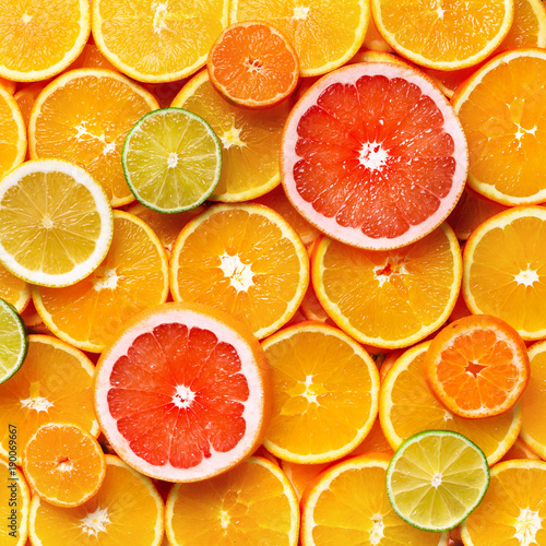 Isolated citrus fruits. Pieces of lemon  lime  pink grapefruit and orange isolated on white background  with clipping path