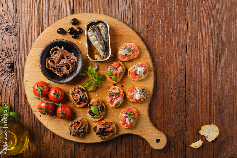Mix Bruschetta with sardines and anchovies. Mix Bruschetta with sardines and anchovies.
