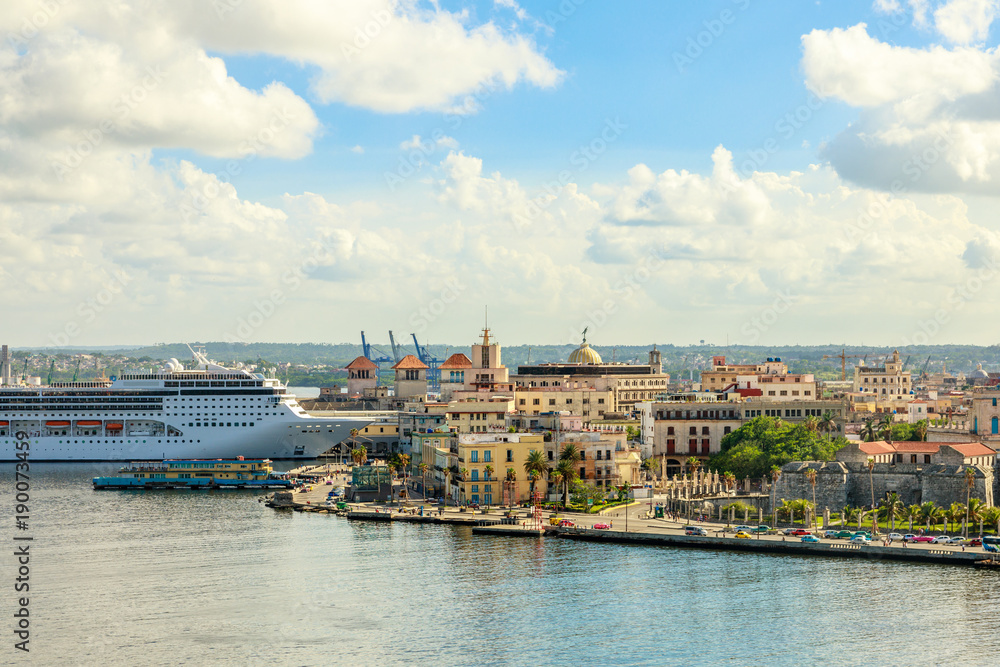 City panorama and big cruise ship docked in port of Havana, Cuba