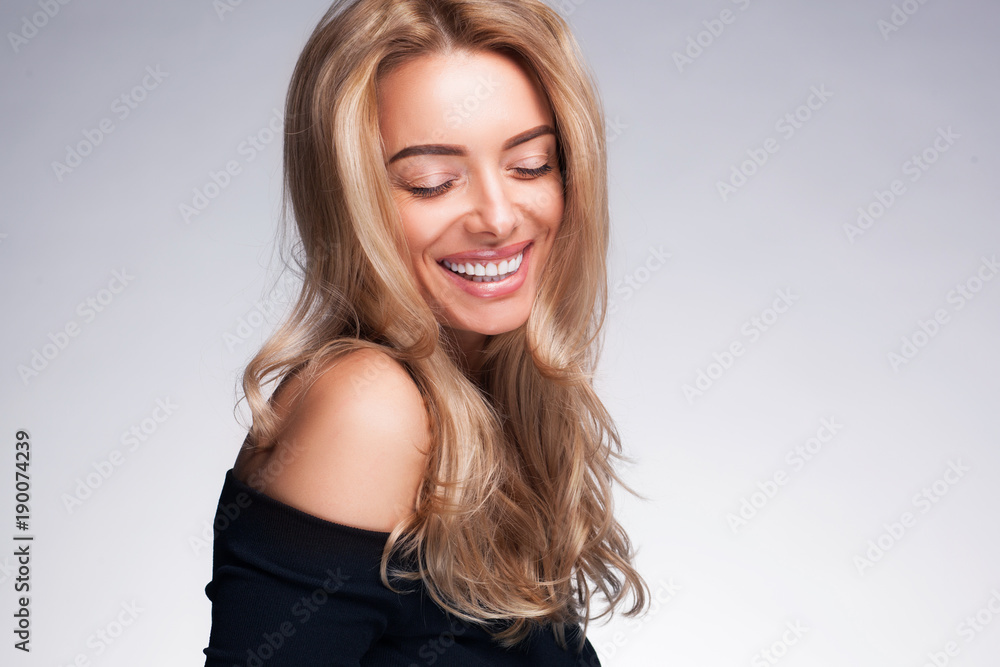 closeup portrait of beautyful blond smiling woman with clean fresh skin closeup portrait of beautyful blond smiling woman with clean fresh skin