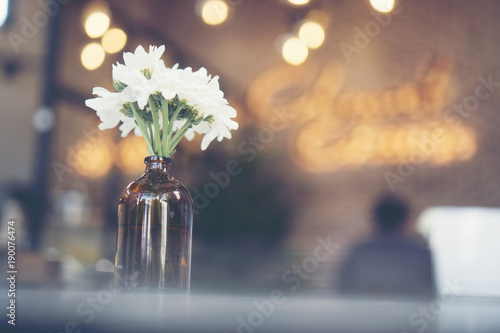 flower in vase in coffee cafe