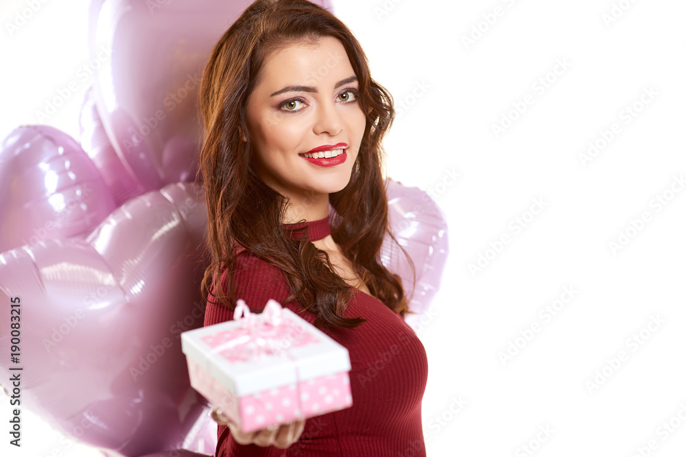 woman with pink heart balloon on a white background woman with pink heart balloon on a white background