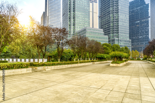 Panoramic skyline and buildings with empty concrete square floor © onlyyouqj