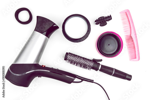 Haircare Concept. Hairdryer With Brush, Hair Mask Treatment And Accessories On White Background