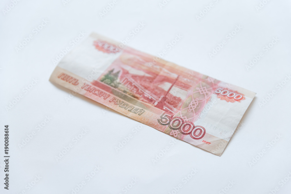 Money in Russia. Banknotes five thousand rubles, background, selective focus. Money in Russia. Banknotes five thousand rubles, background, selective focus.