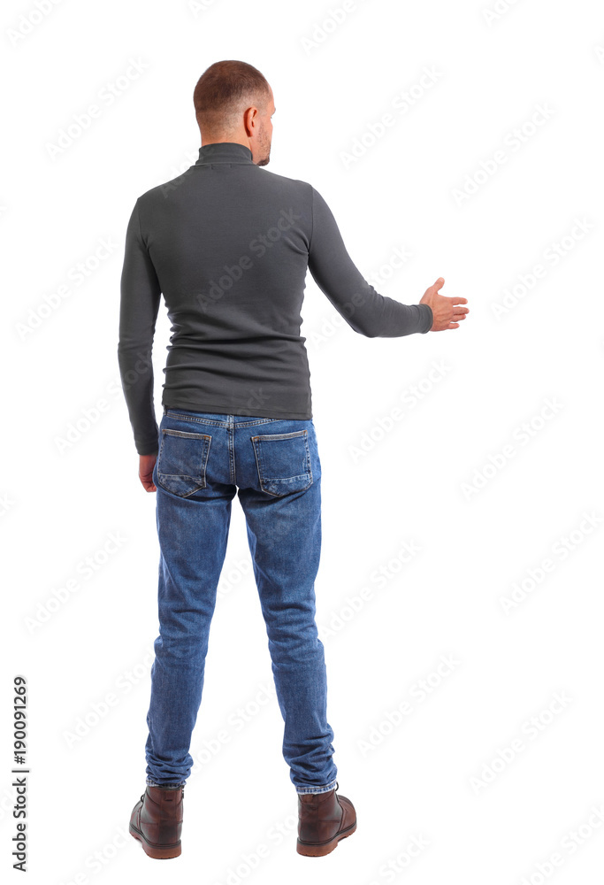 Back side view of man in shirt handshake. Back side view of man in shirt handshake.