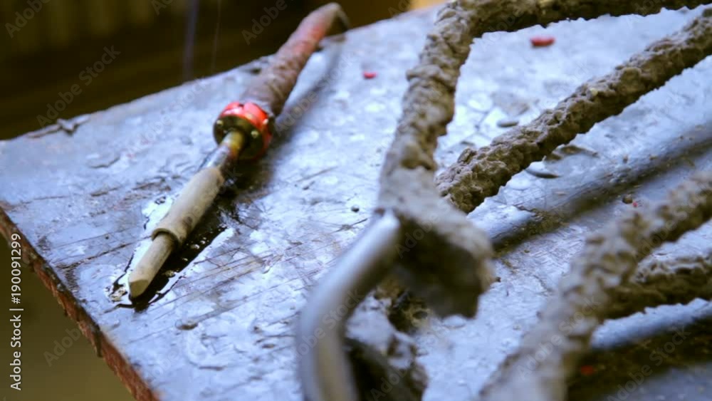 Soldering iron in bronze foundry - smoke Soldering iron in bronze foundry - smoke