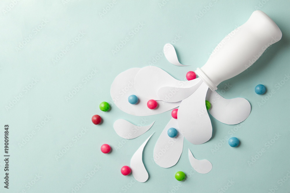 Yogurt bottle with splashes and vitamins Yogurt bottle with splashes and vitamins