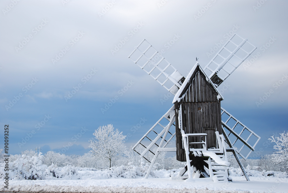 Old windmill in a winter wonderland