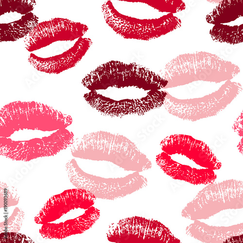 Seamless pattern with pink and red kisses