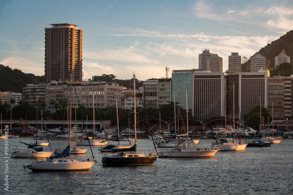 Fototapeta premium Skyline of Rio de Janeiro by Sunset with Boats in Guanabara Bay
