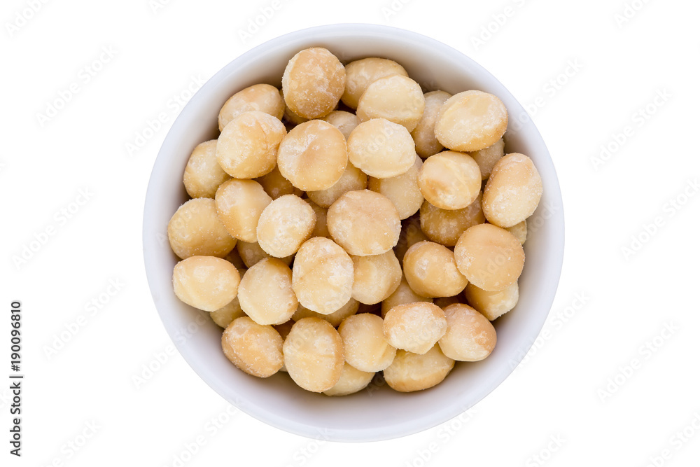 Bowl of fresh healthy shelled macadamia nuts Bowl of fresh healthy shelled macadamia nuts