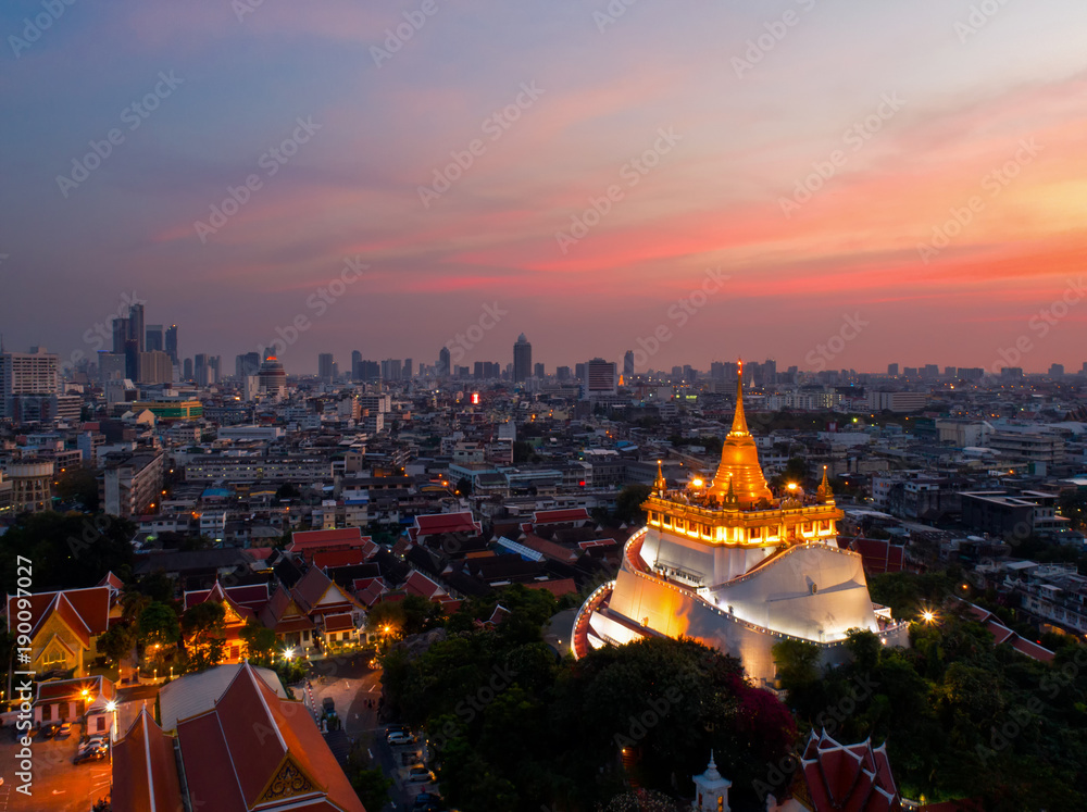 Fototapeta premium Aerial view of Golden Pagoda called Golden Mountain temple the public temple in Bangkok , The most tourist destination landmark in Bangkok