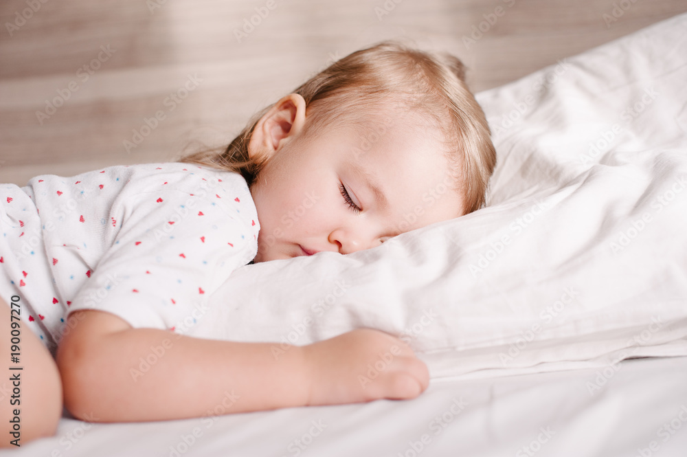 Little child sleeping on her tummy Little child sleeping on her tummy