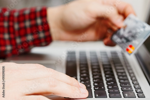 Wallpaper Mural Male person makes an online purchase Torontodigital.ca