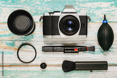 Wallpaper Mural Camera with cleaning kit, flat lay Torontodigital.ca