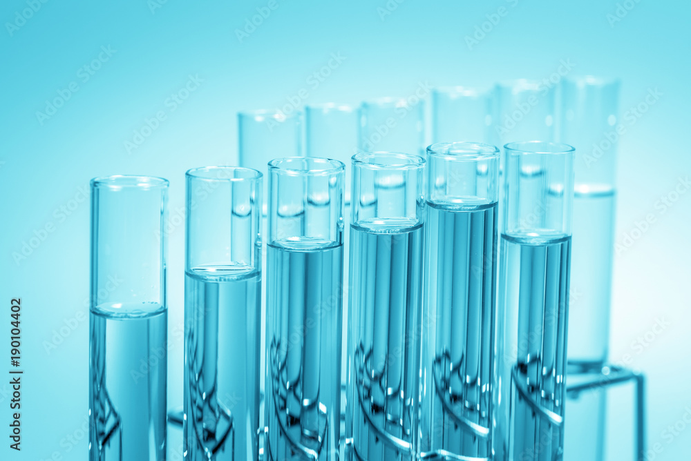 science laboratory test tubes on light blue background , laboratory equipment science laboratory test tubes on light blue background , laboratory equipment