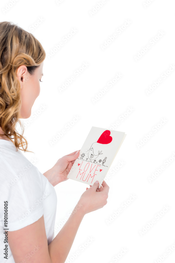 partial view of woman with postcard in hands isolated on white, mothers day concept partial view of woman with postcard in hands isolated on white, mothers day concept
