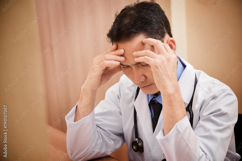 Asian Senior male doctor is thinking. Asian Senior male doctor is thinking.