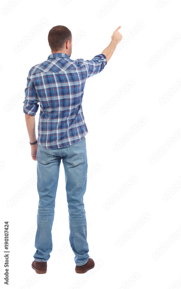 Back view of pointing young men in shirt and jeans. Back view of pointing young men in shirt and jeans.