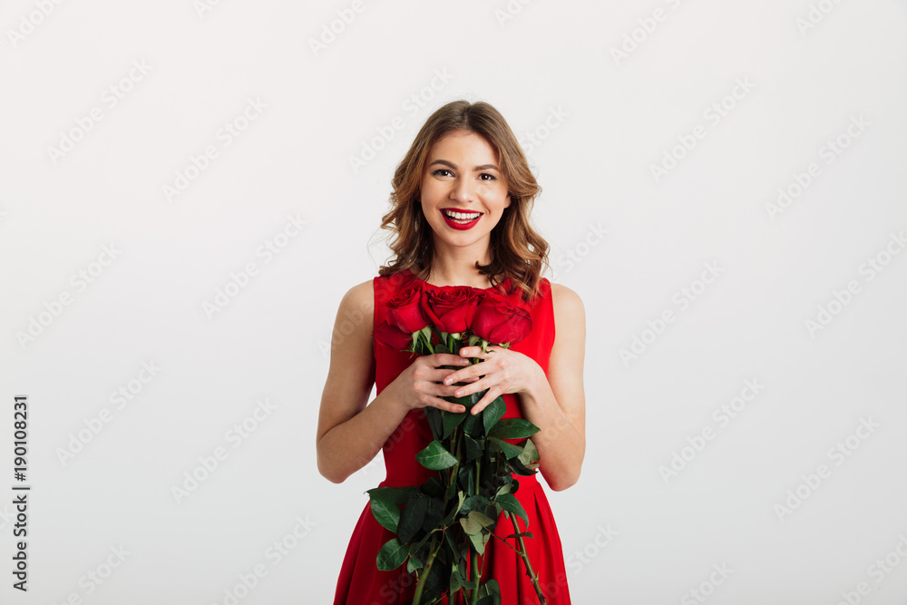 Full length portrait of a smiling young woman Full length portrait of a smiling young woman