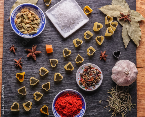 Set of ingredients for pasta cooking, directly above view. photo