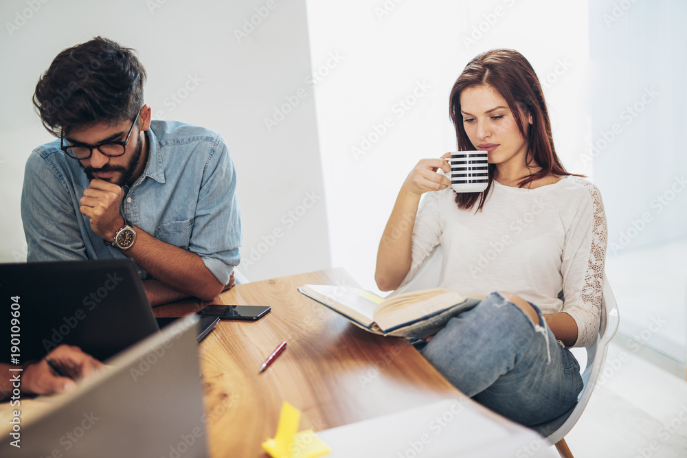 Students study at home. Learning and preparing for university exam. Students study at home. Learning and preparing for university exam.