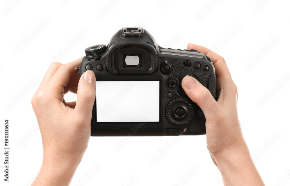 Photographer holding professional camera on white background Photographer holding professional camera on white background