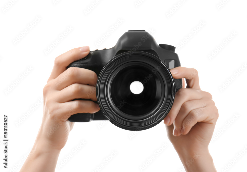 Photographer holding professional camera on white background Photographer holding professional camera on white background