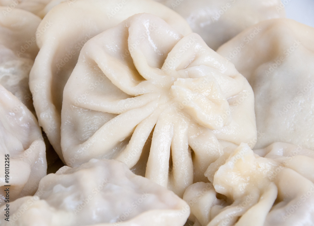 Khinkali - Georgian traditional food. Handmade rustic worldwide recipe book. Khinkali - Georgian traditional food. Handmade rustic worldwide recipe book.