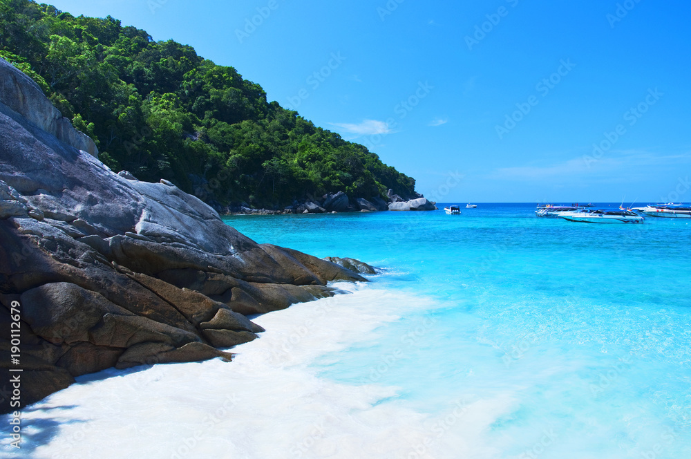 Fototapeta premium Beautiful sea landscape with tropical coast and the high-speed boat, Similan Islands, Andaman Sea, Thailand. 