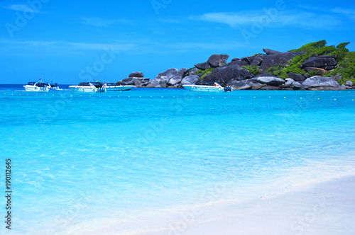 Beautiful sea landscape with tropical coast and the high-speed boat, Similan Islands, Andaman Sea, Thailand. 