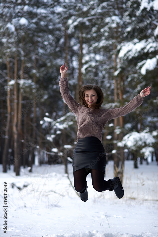 Beautiful woman blowing in the snow Beautiful woman blowing in the snow