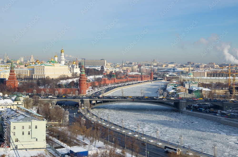 The Winter view of the Moscow Kremlin, Big Stone bridge and the Moscow river from the observation platform of Cathedral of Christ the Saviour, Moscow, Russia