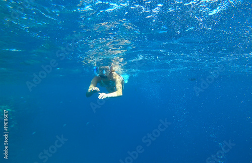 girl and snorkeling