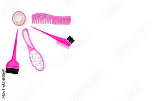 Professional hairdressing tools in beauty saloon. Combs, brushes on white background top view copy space