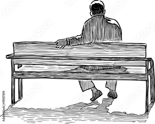 A lonely man sits on a bench
