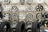 Rack with car wheels in automobile store