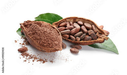 Halves of ripe cocoa pod with beans and powder on white background