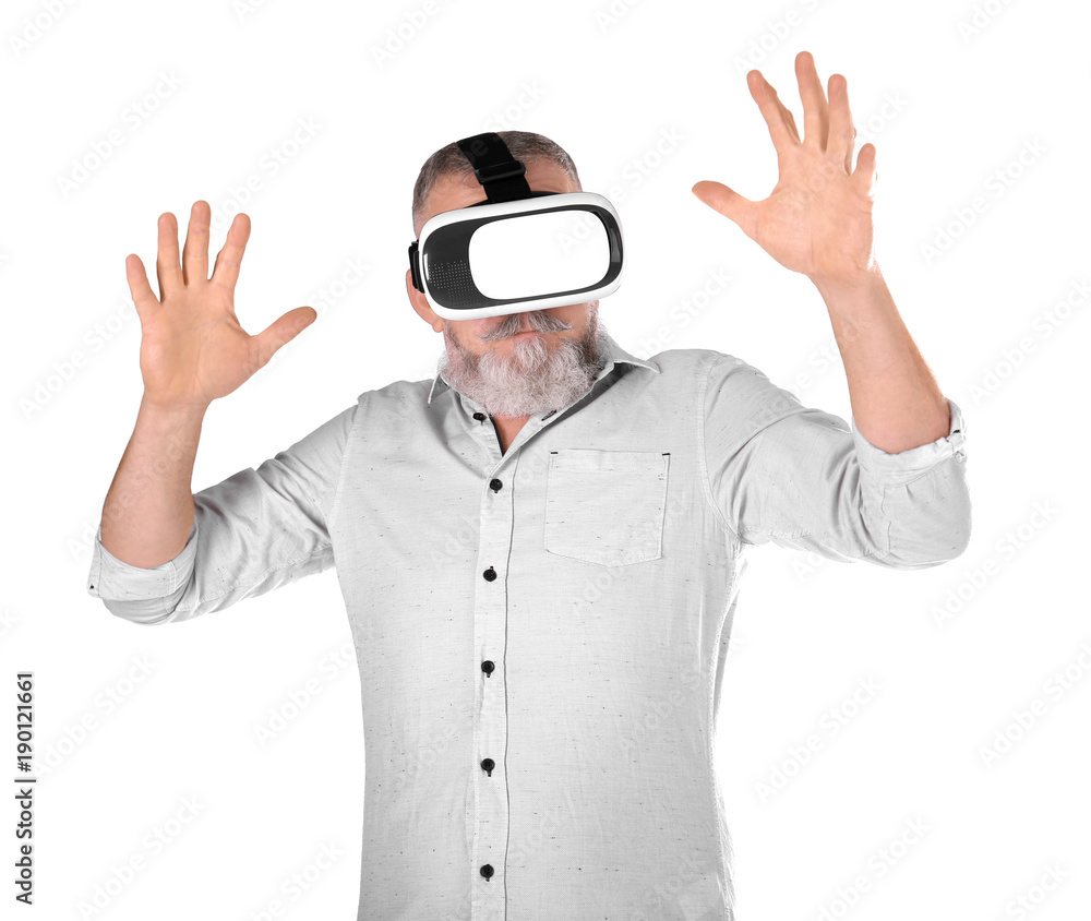 Senior man with virtual reality headset on white background Senior man with virtual reality headset on white background