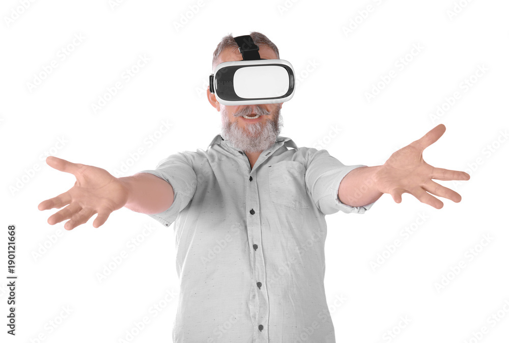 Senior man with virtual reality headset on white background Senior man with virtual reality headset on white background