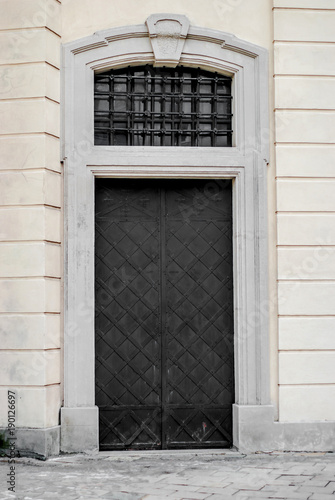 Ancient door in an old house © romankrykh