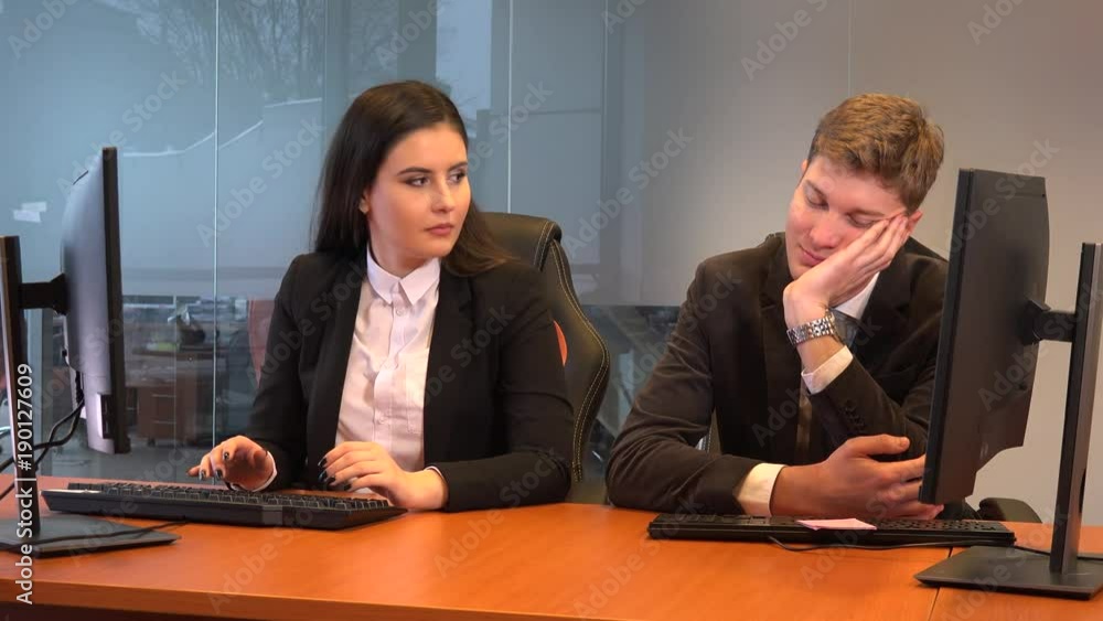 Naughty bad team player businessman sleeping indoor workplace colleagues working Naughty bad team player businessman sleeping indoor workplace colleagues working